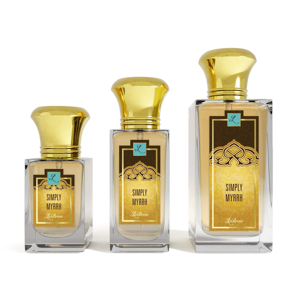 Three bottles of the Simply Myrrh products shown that are 1.0 - 3.4 oz lined up from smallest to biggest. Their label captivates a  gold and black moroccan style to the label.. The background is white.