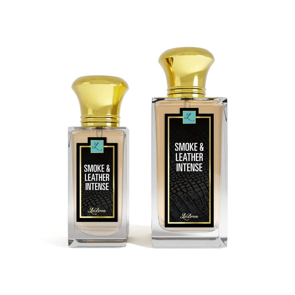  Two bottles of the Smoke & Leather Intense products shown that are 1.7 - 3.4 oz lined up from smallest to biggest. Their label captivates a black & white letter style to the label. The background is white.