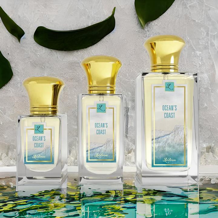 Three of the ocean's Coast intense for women products captivates a nice ocean smell. This products shows a natural plant like background with a reflective ocean flooring. 